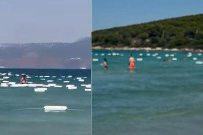 Çeşme’de denizden gelen gizem! Yüzlerce kutu deniz yüzeyini kapladı