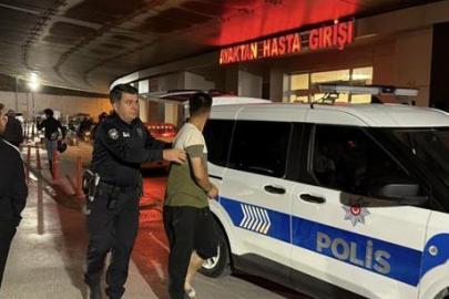 Eşi tarafından zorla tutulduğu kamyonetin kapısını açıp kendini yola attı